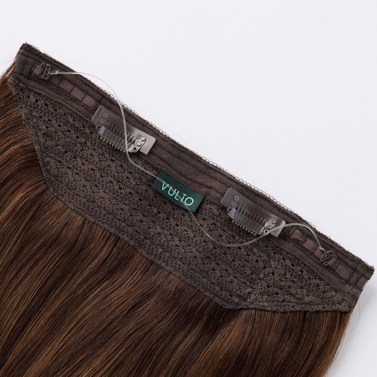Brown clip-in hair extensions with a lace top band, clear adhesive clips, and a green VULIO brand tag, shown against a light gray background.